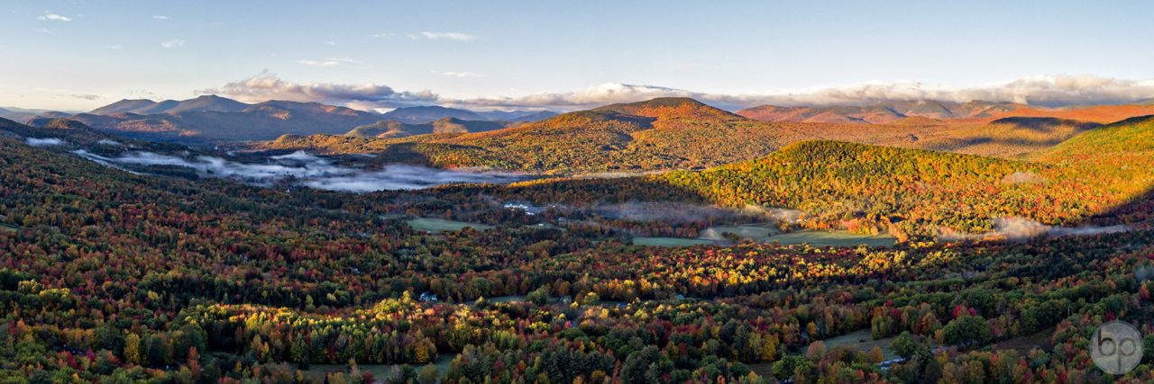 Aerial photo of Jackson, New Hampshire foliage and fog.